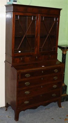 Lot 1376 - A mahogany veneered bureau bookcase