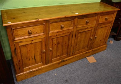 Lot 1379 - A pine sideboard