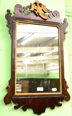 Lot 1384 - A George III style mahogany fret work mirror