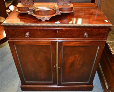 Lot 1392 - A late Victorian mahogany side cabinet, with a single drawer above two cupboard doors