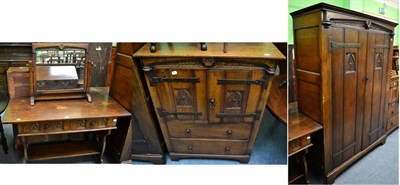 Lot 1398 - A oak five piece bedroom suite comprising a double wardrobe, a cabinet, a dressing table and a...