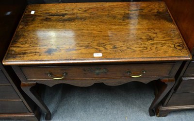 Lot 1403 - An 18th century style oak side table