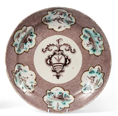 Lot 219 - A Savona Faience Circular Dish, 18th century, painted in manganese with an armorial on a...