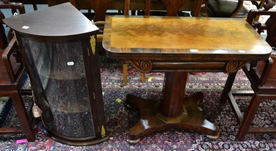 Lot 1422 - A 19th century fold over mahogany card table together with a small mahogany glazed bow corner...