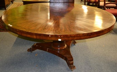 Lot 1435 - A large Regency mahogany and crossbanded circular breakfast table, tilt-top, central column,...