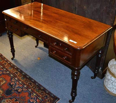 Lot 1436 - A Victorian mahogany kneehole desk