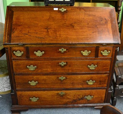 Lot 1443 - An early 19th century mahogany bureau