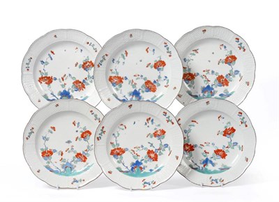 Lot 224 - A Set of Six Meissen Porcelain Plates, circa 1740, painted in Kakiemon style with flowers within an