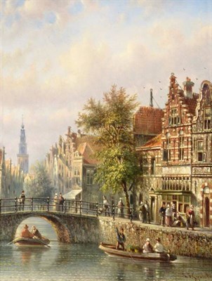 Lot 34 - Johannes Franciscus Spohler (1853-1923) Dutch Busy Dutch canal scene, probably Amsterdam...