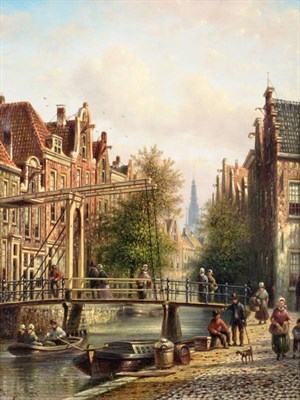 Lot 34 - Johannes Franciscus Spohler (1853-1923) Dutch Busy Dutch canal scene, probably Amsterdam...