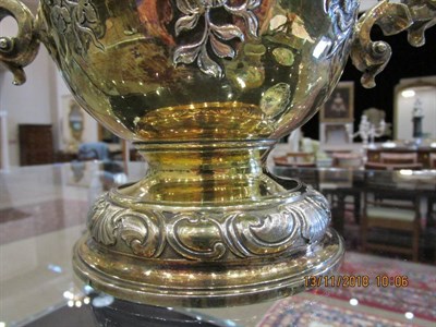 Lot 86 - A George II Silver Gilt Cup and Cover, Thomas Whipham, London 1742, with domed cover, C scroll...