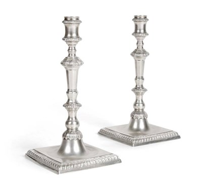 Lot 95 - A Pair of Cast Silver Candlesticks of George III Style, maker's mark JLC, London 1964, the...