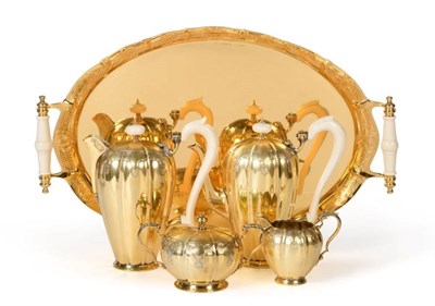 Lot 112 - A Silver Gilt Four Piece Coffee Service with Twin Handled Tray En Suite, Garrard & Co, London...