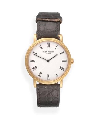 Lot 123 - An 18ct Gold Automatic Wristwatch, signed Patek Philippe, model: Calatrava, ref: 5120J-001,...