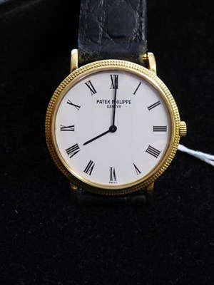 Lot 123 - An 18ct Gold Automatic Wristwatch, signed Patek Philippe, model: Calatrava, ref: 5120J-001,...