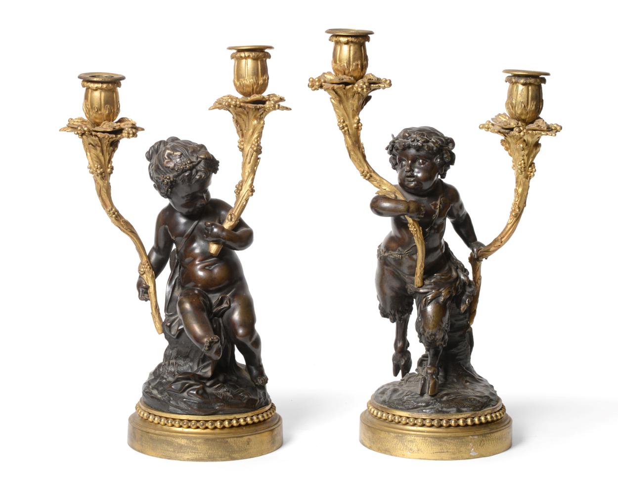 Lot 265 - A Pair of French Gilt and Patinated Bronze Candelabra, late 19th century, after a model by...