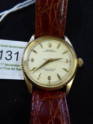 Lot 131 - An 18ct Gold Automatic Centre Seconds Wristwatch, signed Rolex, Oyster Perpetual, Officially...