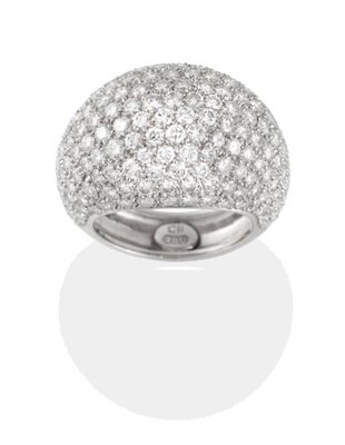 Lot 152 - A Diamond Dress Ring, the tapering dome pavé set with round brilliant cut diamonds, total...