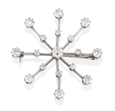 Lot 159 - A Diamond Snowflake Brooch/Pendant, a central round brilliant cut diamond in a claw setting to...