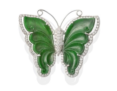 Lot 164 - A Jade and Diamond Butterfly Brooch/Pendant, with carved jade wings within borders of round...