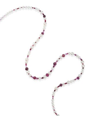 Lot 171 - A Ruby and Cultured Pearl Necklace, graduated faceted and round shaded ruby beads spaced by...
