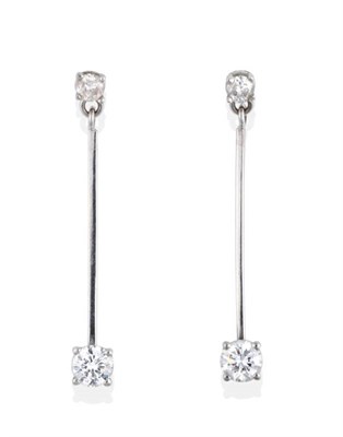 Lot 173 - A Pair of Diamond Pendant Earrings, round brilliant cut diamond studs suspending larger round...