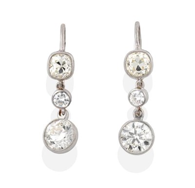 Lot 189 - A Pair of Early Twentieth Century Diamond Earrings, grain set old cushion cut diamonds suspend...