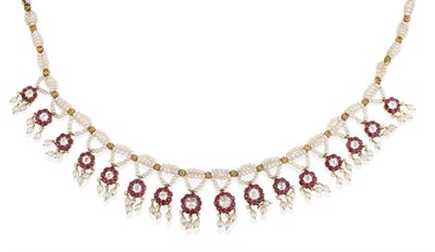 Lot 200 - A Circa 1900s Seed Pearl, Ruby and Rock Crystal Necklace, the front with graduated drops formed...