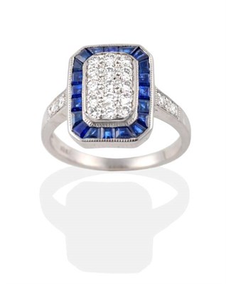 Lot 213 - A Sapphire and Diamond Ring, a canted oblong plaque pavé set with round brilliant cut diamonds...