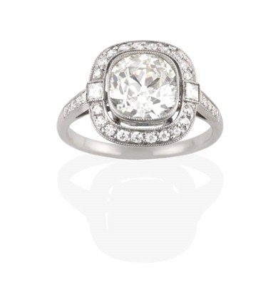 Lot 221 - An Art Deco Style Diamond Cluster Ring, a grain set old cushion cut diamond within a diamond...