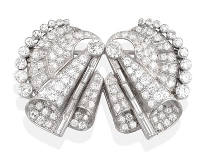 Lot 228 - An Art Deco Circa 1935 Diamond Double Clip Brooch, as pavé set diamond double scrolls, total...