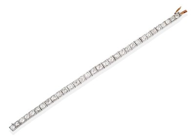 Lot 232 - A French Old Cut Diamond Line Bracelet, in square settings as individual links, total estimated...