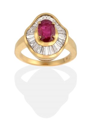 Lot 258 - A Ruby and Diamond Cluster Ring, an oval cut ruby in a claw setting, within an undulating border of