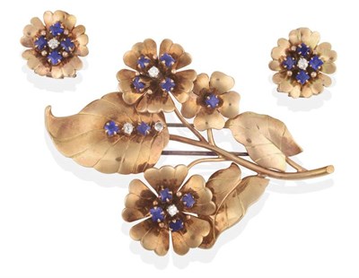 Lot 260 - A Circa 1940s Sapphire and Diamond Floral Brooch and Earring Suite, the brooch of three flower...