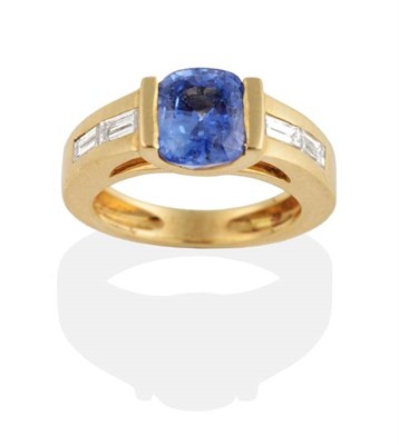Lot 266 - A Sapphire and Diamond Ring, a cushion cut sapphire in a tension setting, to a tapering shank...