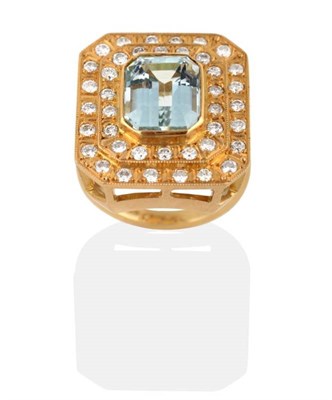 Lot 274 - An 18 Carat Gold Aquamarine and Diamond Cluster Ring, an octagonal cut aquamarine in a rubbed...