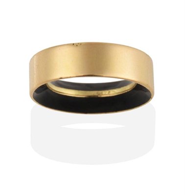 Lot 276 - A French Enamel Ring by Mauboussin, a central band of black enamel to an outer plain gold band,...