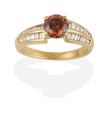 Lot 278 - A Coloured Diamond Ring, a round brilliant cut fancy brown orange diamond in a claw setting, to...