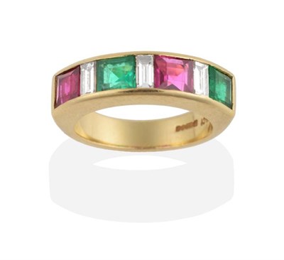 Lot 283 - An 18 Carat Gold Emerald, Ruby and Diamond Half Hoop Ring, channel set baguette cut emeralds...