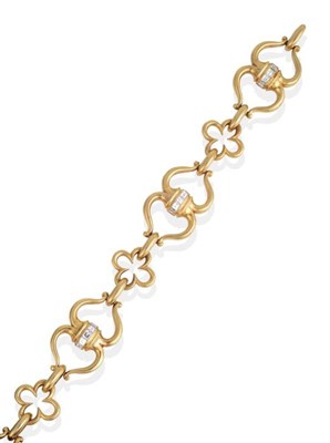 Lot 290 - An 18 Carat Gold Diamond Bracelet, channel set square cut diamonds to double hoop links, spaced...