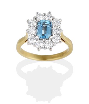 Lot 292 - An 18 Carat Gold Aquamarine and Diamond Ring, an octagonal cut aquamarine in a claw setting, within