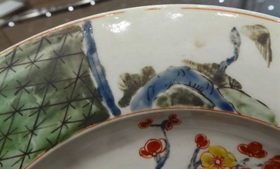 Lot 327 - An Early Worcester Porcelain Plate, circa 1752, painted in famille verte style with a bird...