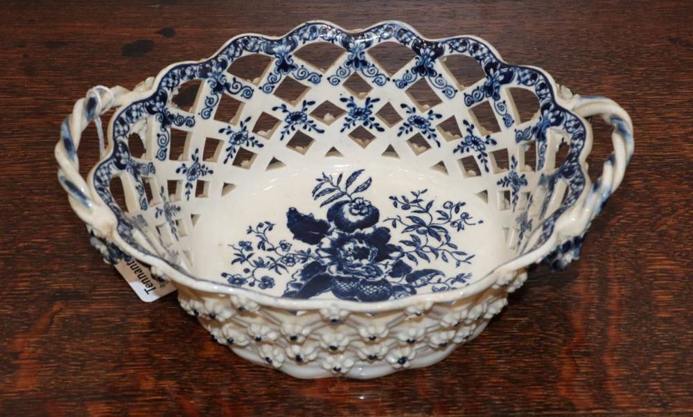 Lot 332 - A Lowestoft Porcelain Oval Basket, circa 1780, printed in underglaze blue with the Pine Cone...