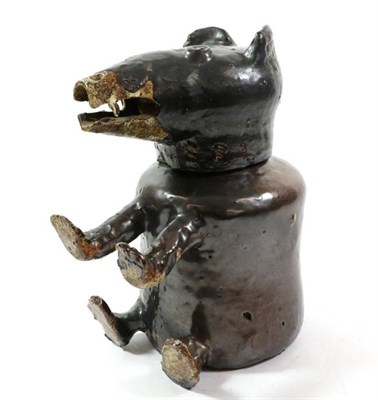 Lot 340 - A Brown Glazed Stoneware Bear Jug and Cover, early 19th century, the seated animal with its...