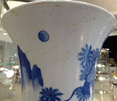 Lot 354 - A Chinese Porcelain Beaker Vase, in Kangxi style, painted in underglaze blue with figures on a...