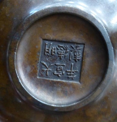 Lot 369 - A Chinese Bronze Censer, Ding, bears six character Xuande reign mark, of ovoid form with reeded...