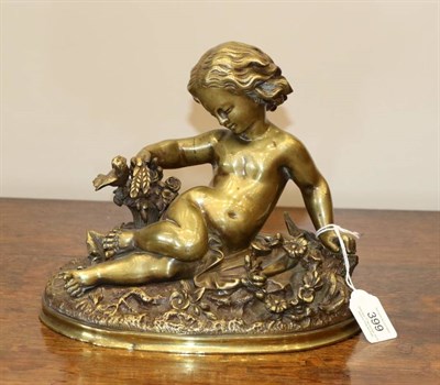 Lot 399 - French School (19th century): A Bronze Figure of a Young Girl, recumbent holding a basket of...