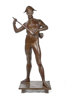 Lot 404 - Paul Dubois (French, 1829-1905): A Bronze Figure of Harlequin, standing holding his slapstick,...