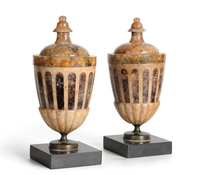 Lot 410 - A Pair of Derbyshire Blue John Fluorspar Urns, 19th century, with minaret finials and gadrooned...
