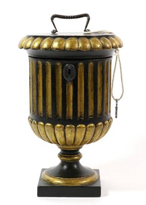 Lot 414 - A Gilt and Ebonised Wood Tea Canister, early 19th century, of fluted campana form with...